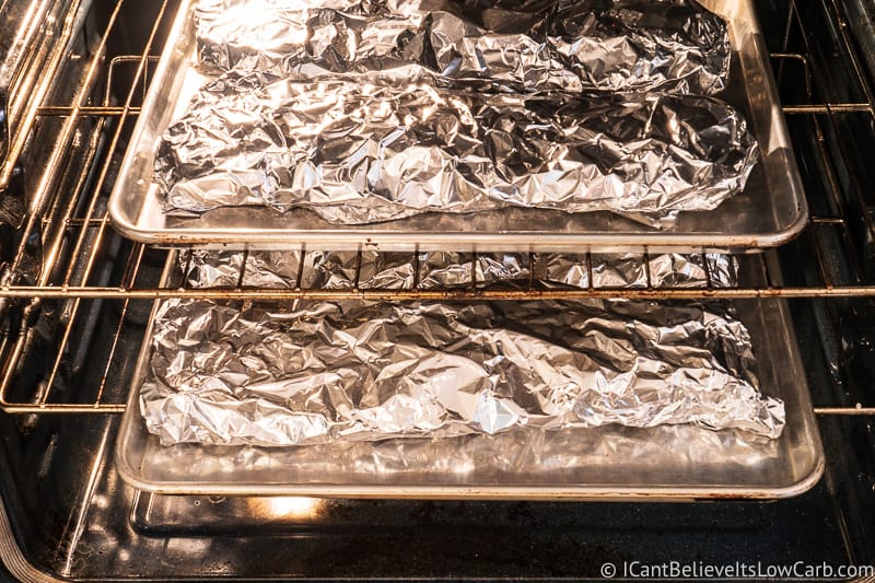 Baked Baby Back Ribs in Oven wrapped in foil