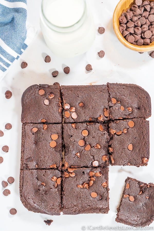 Keto Brownies on a table with glass of milk