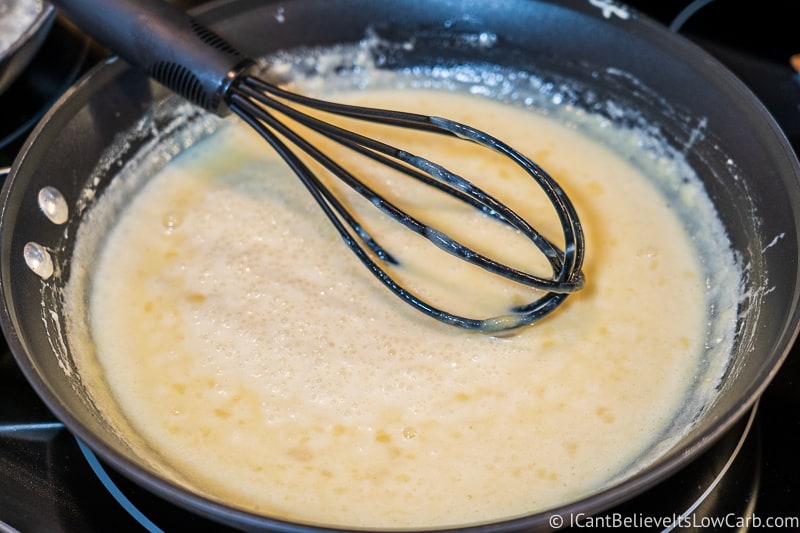 cooking Keto Condensed Milk on stove