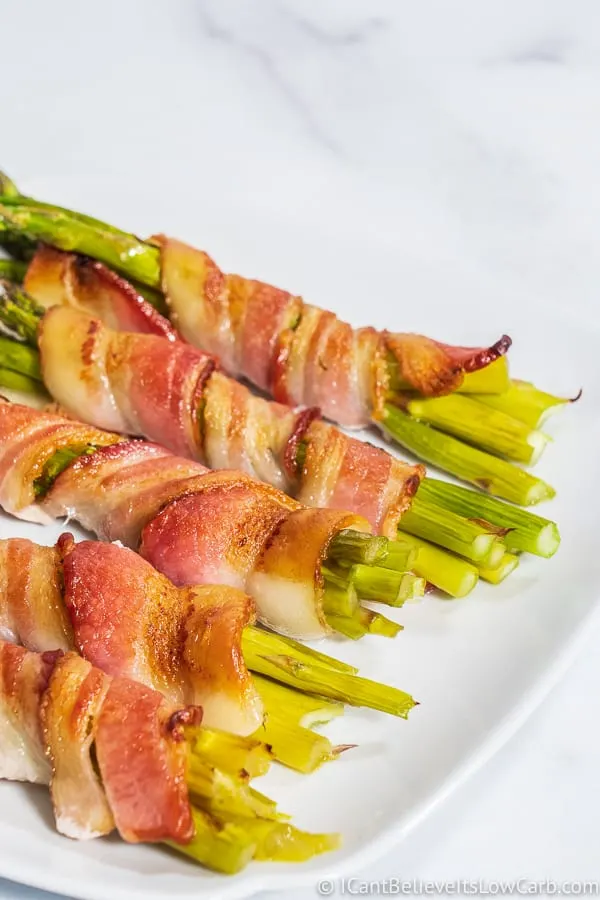 cooked Bacon Wrapped Asparagus on plate