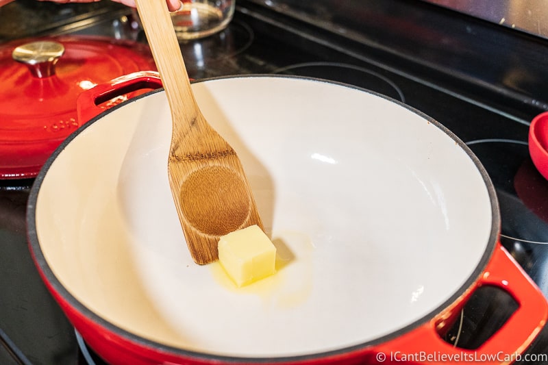 melting butter on stove for Apple Crisp recipe