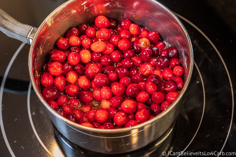 cranberries cooking on the stove for Cranberry Sauce Recipe