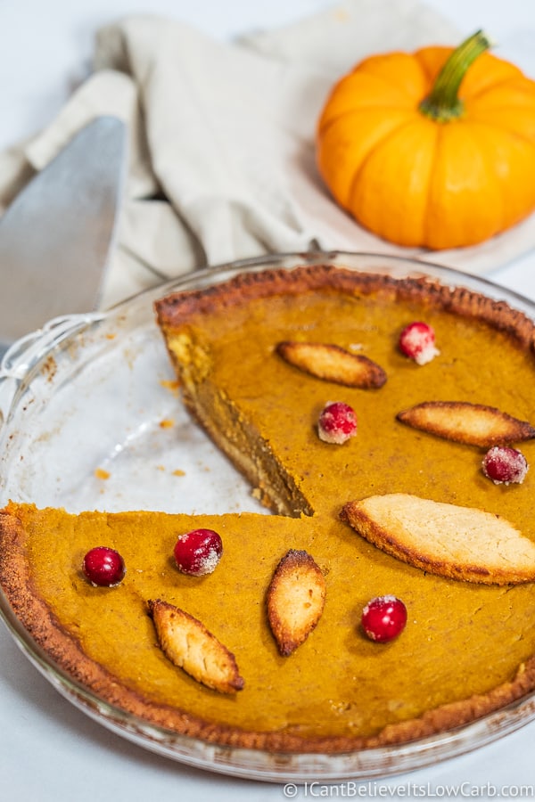 Keto Pumpkin Pie with a slice missing