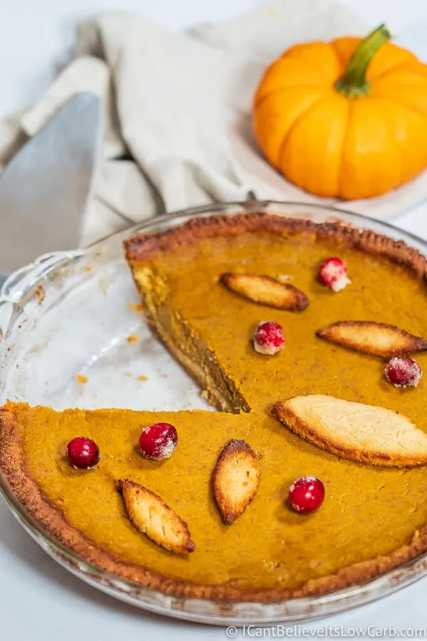 Keto Pumpkin Pie with a slice missing