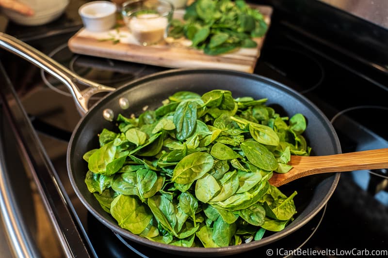 Spinach cooking in pan