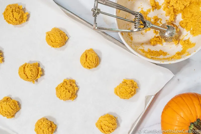 scooping out Keto Pumpkin Snickerdoodle Cookies