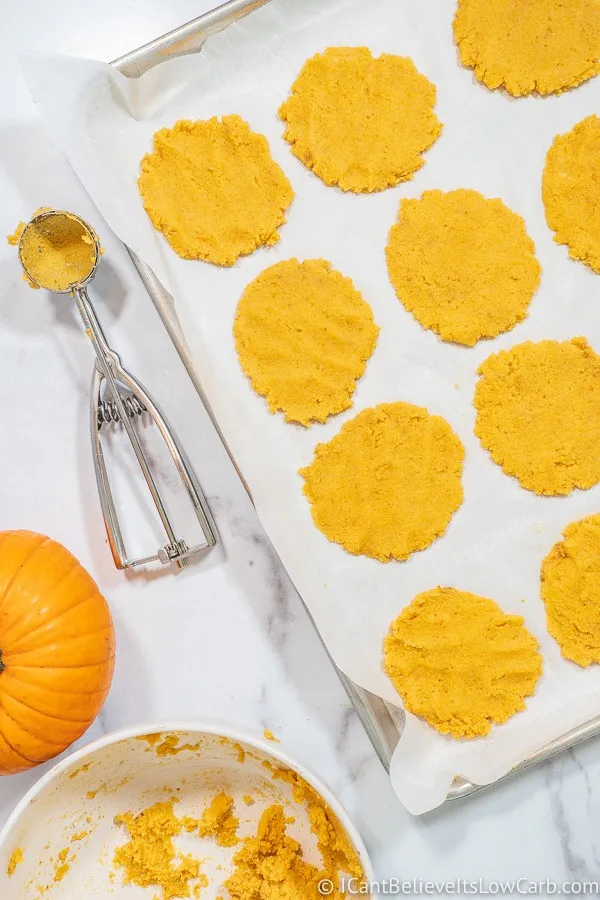 Keto Pumpkin Snickerdoodle Cookies on sheet pan ready to put in oven