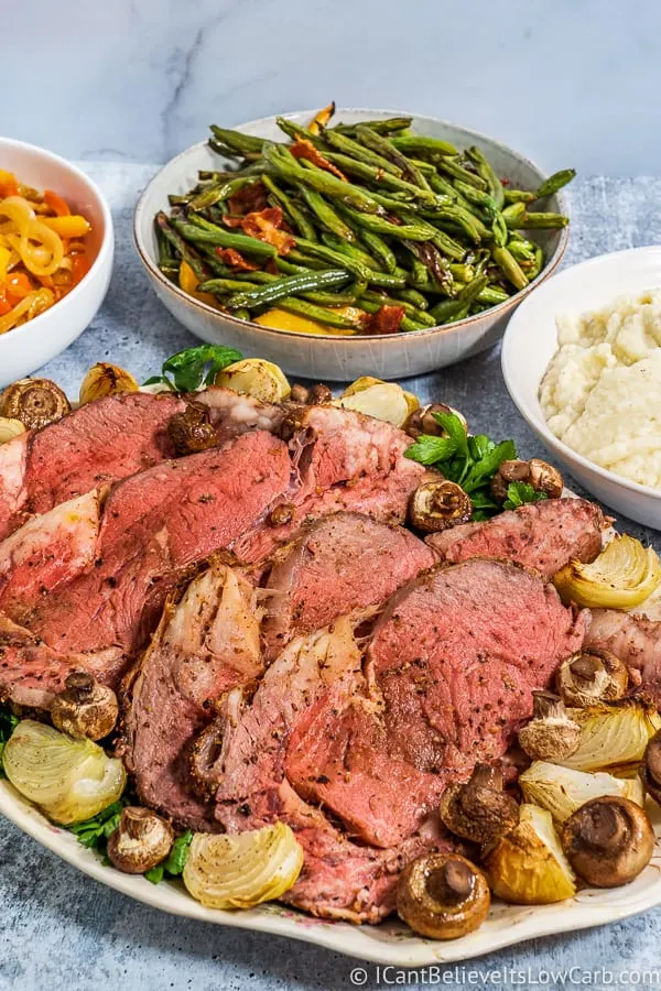 serving roasted Prime Rib on tray