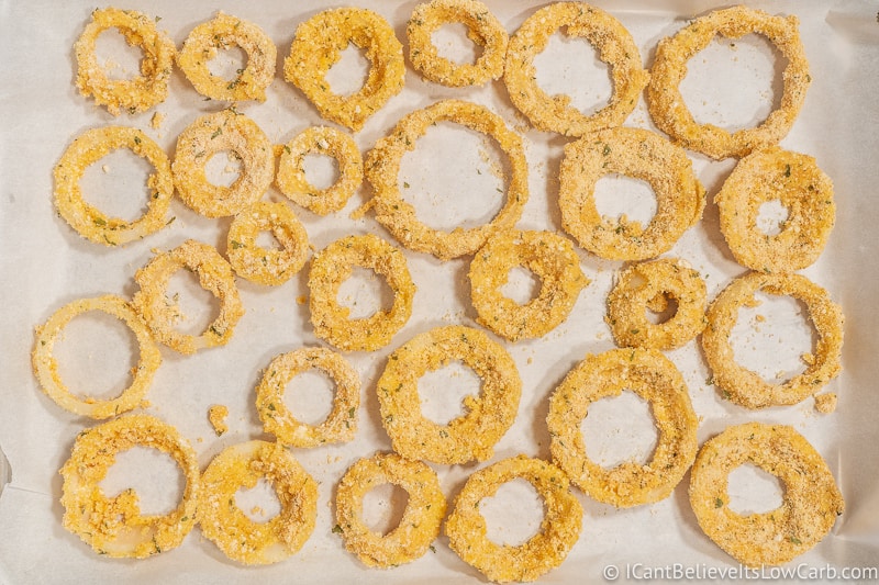Laying Keto Onion Rings on a tray