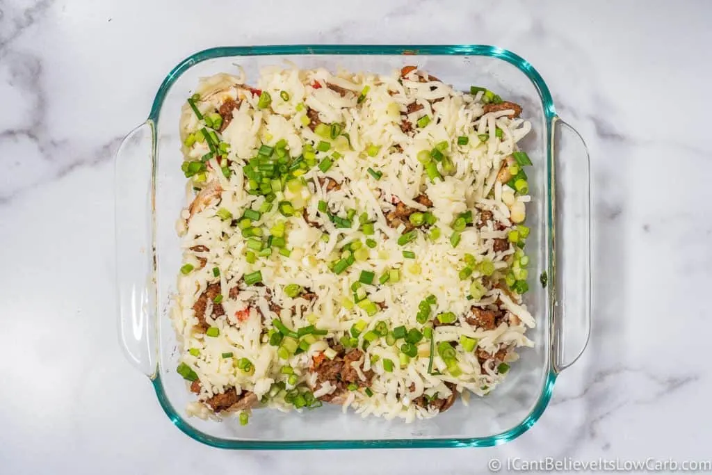 putting Keto Stuffed Mushrooms in oven