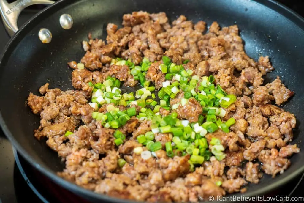 Stuffed Mushrooms sausage cooking in pan