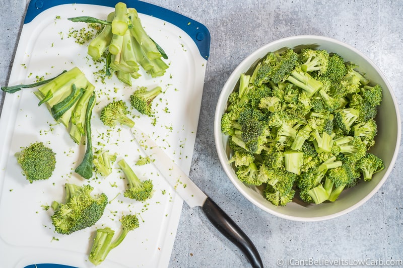 cutting broccoli on board