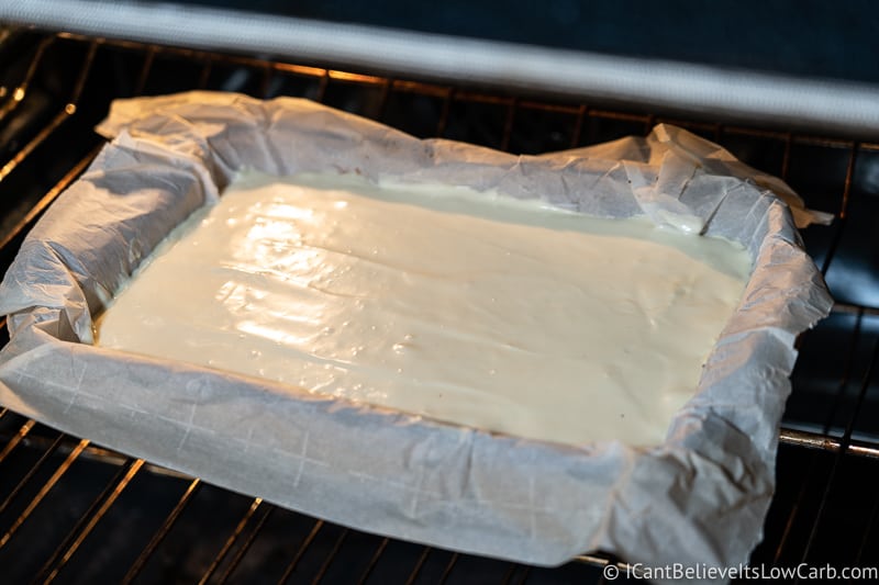 Keto Cheesecake Bars baking in the oven