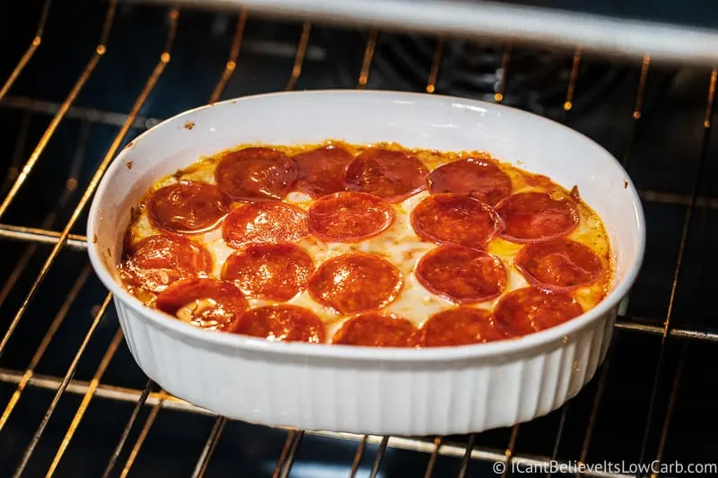 Keto Pepperoni Pizza Dip baking in the oven