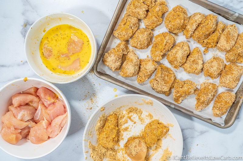 laying out Keto Chicken Nuggets on a tray