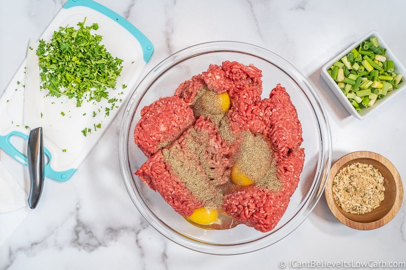 mixing meat for Keto Meatloaf
