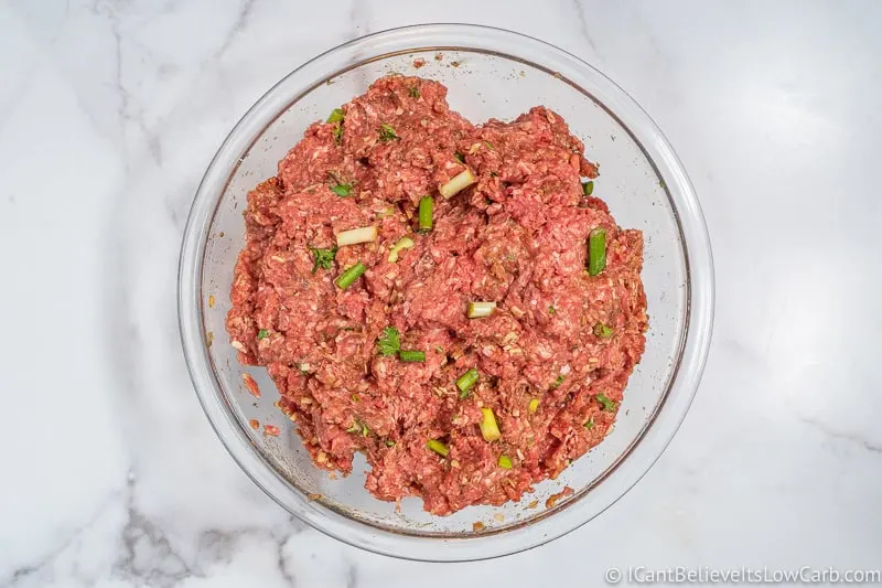 mixing Keto Meatloaf meat