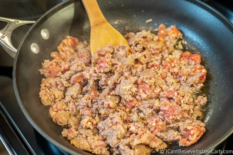 cooking sausage for Low Carb Keto Stuffed Peppers