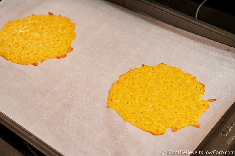 freshly baked Keto Cheese Taco Shells on baking tray