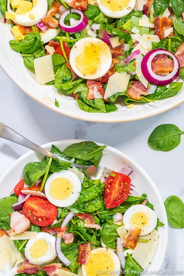 two bowls of Spinach Salad with bacon