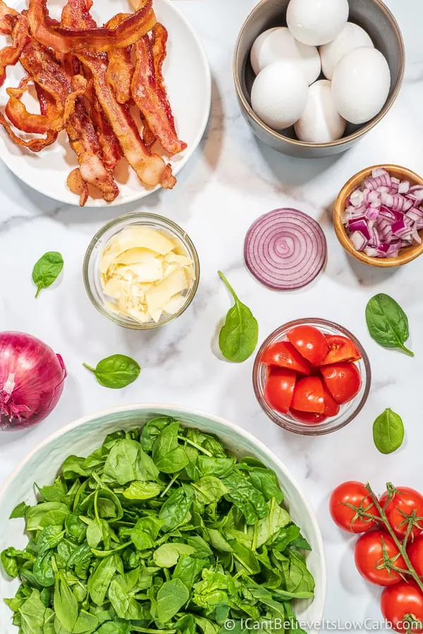 Spinach Salad ingredients with eggs and bacon