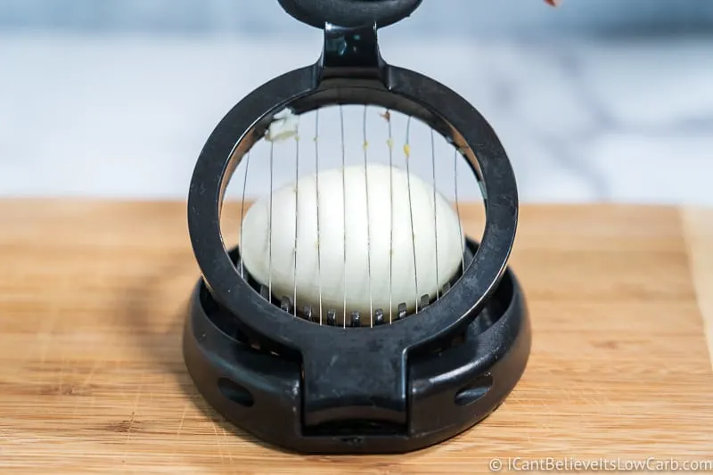 slicing a hard-boiled egg