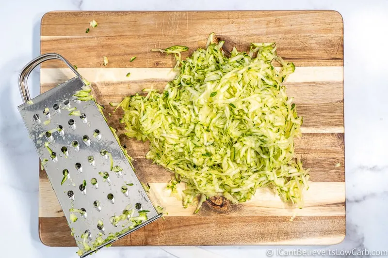 grated Zucchini on cutting board for bread