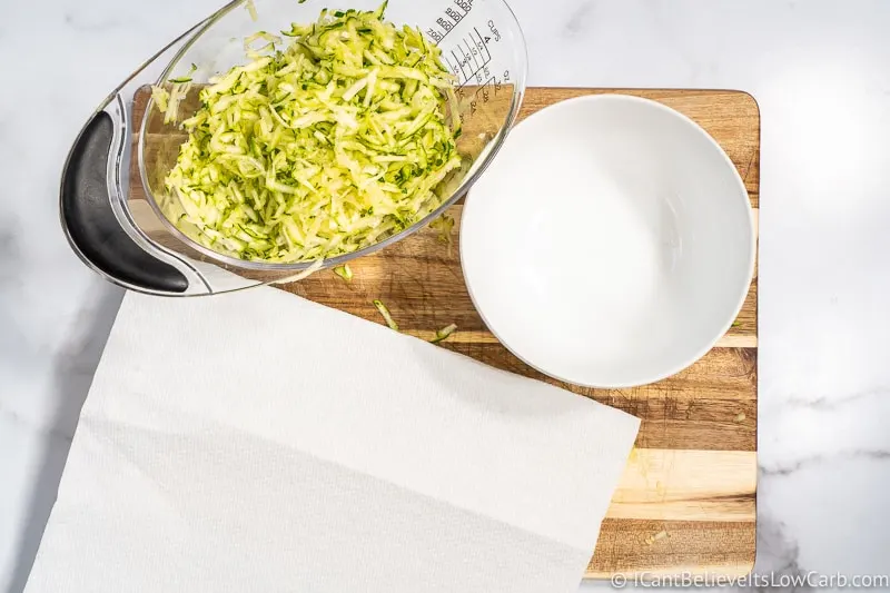 grated Zucchini for Bread in measuring cup