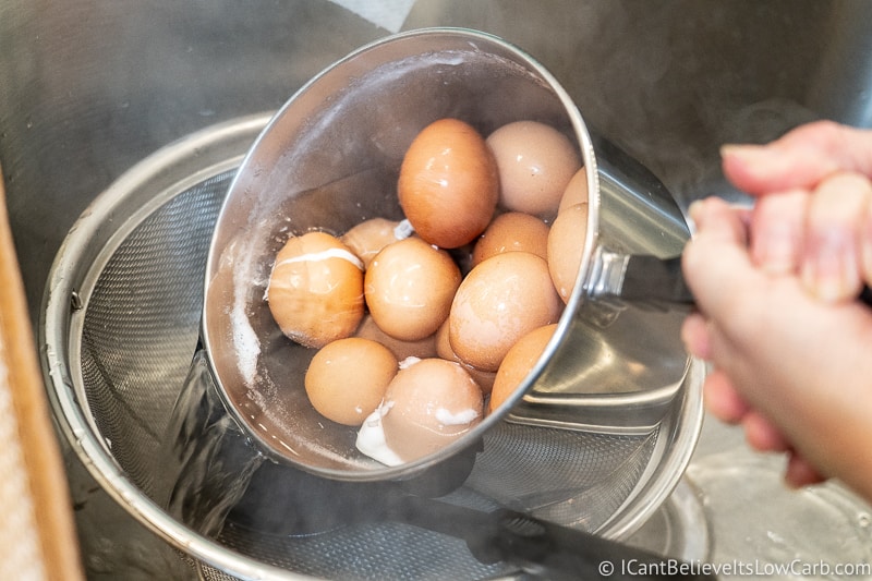 draining hard-boiled eggs in colander