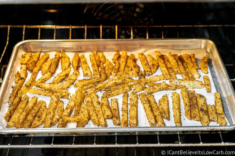 Keto Jicama Fries baking in the oven