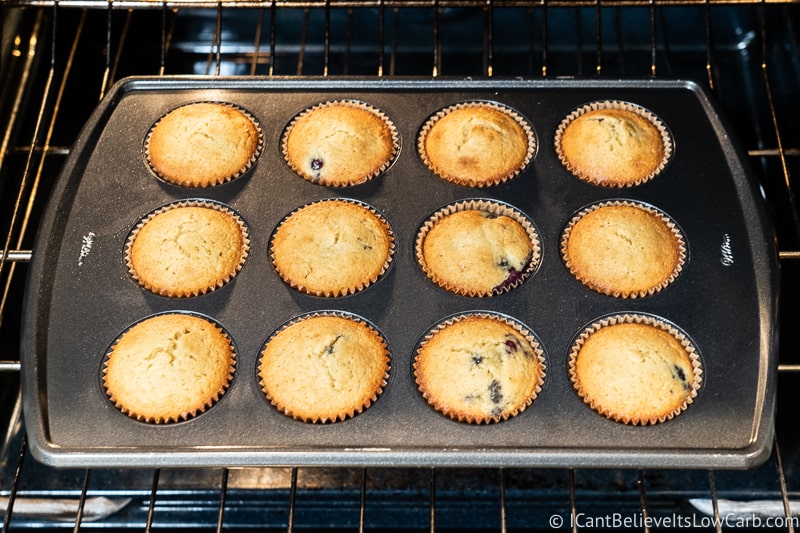Keto Blueberry Muffins baking in the oven