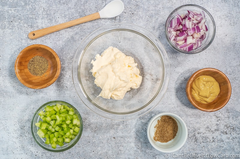Mayonnaise in a bowl with Chicken Salad ingredients