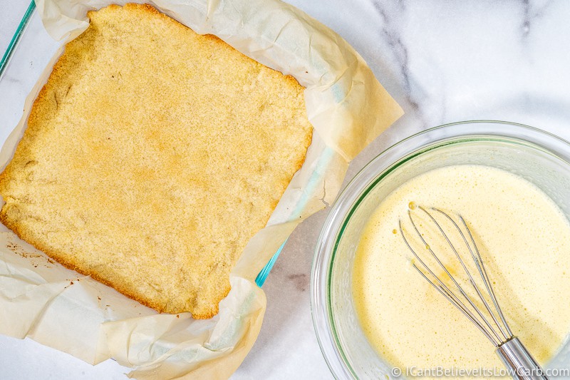 almond flour cookie crust and bowl of sugar free lemon curd