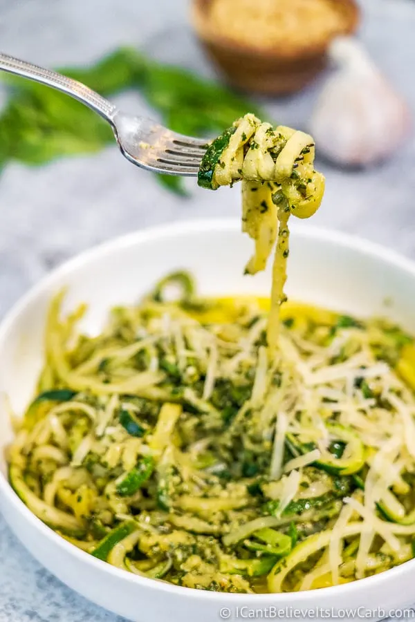 Pesto Zucchini Noodles twirled on a fork