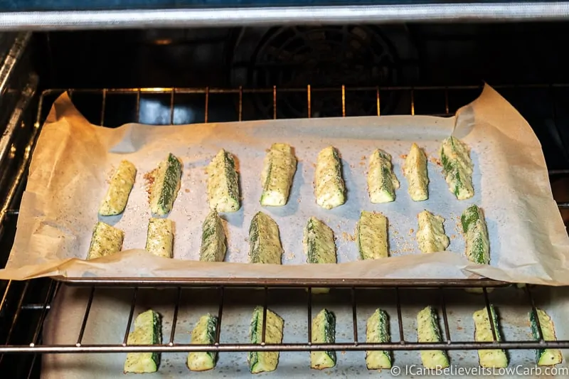 Two trays of Zucchini Fries baking in the oven