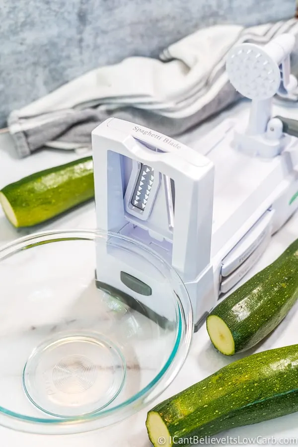 Zucchini Spiralizer on counter with glass bowl