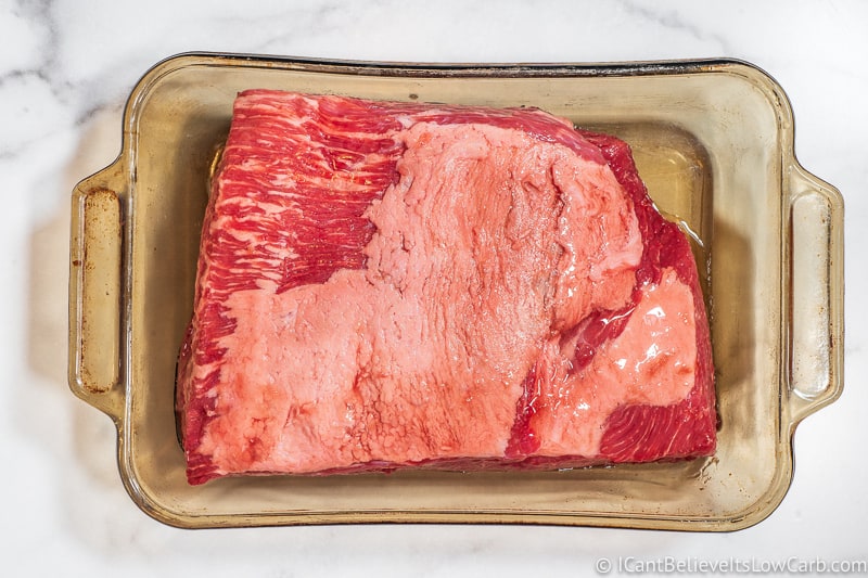 uncooked Corned Beef in baking dish