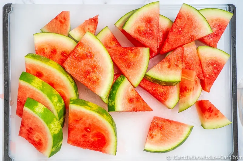 cutting board full of Watermelon triangles