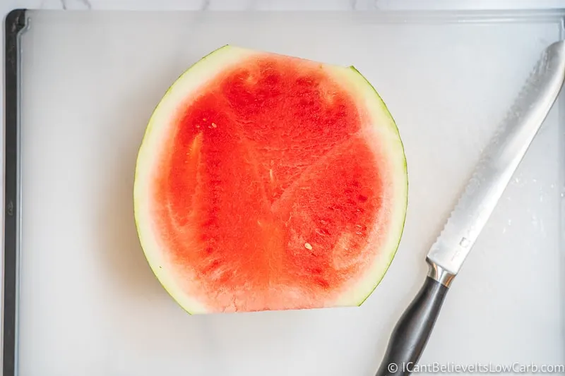 half a Watermelon on a cutting board