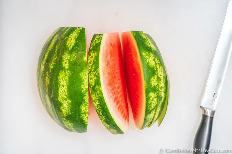 Cutting thick slices of Watermelon