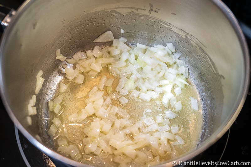 butter and onions sautéing in pan