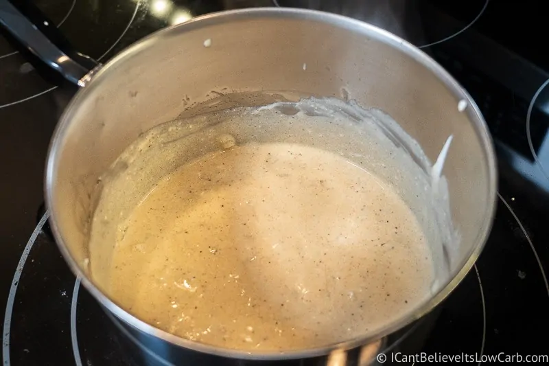 cream for Zucchini Casserole cooking on stove