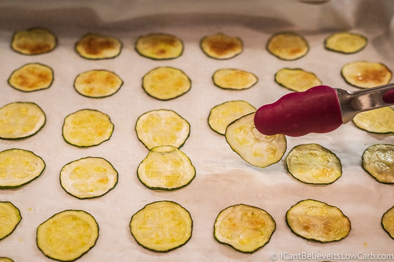 flipping Zucchini Chips while baking