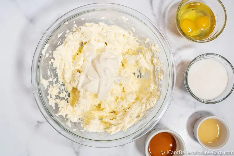 mixing sour cream and cream cheese