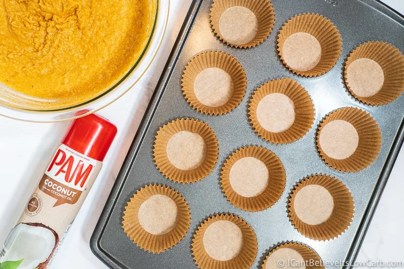 baking tray with muffin liners and Pam