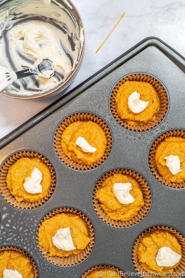 adding sugar free frosting to pumpkin mixture