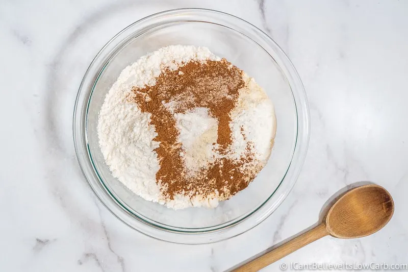 adding salt to bowl of ingredients