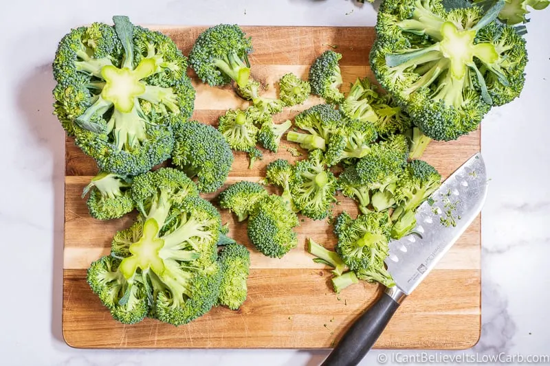 Chopping Broccoli on cutting board