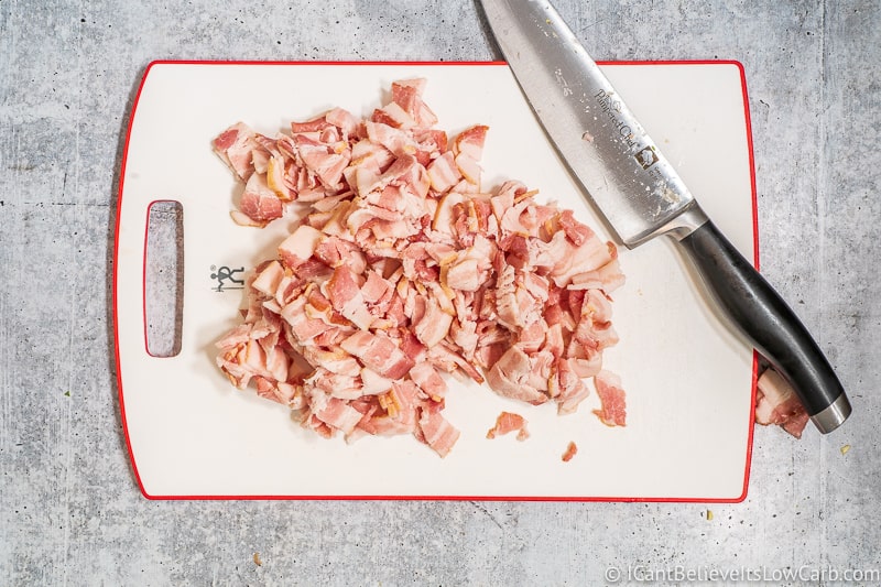 chopping raw bacon before frying
