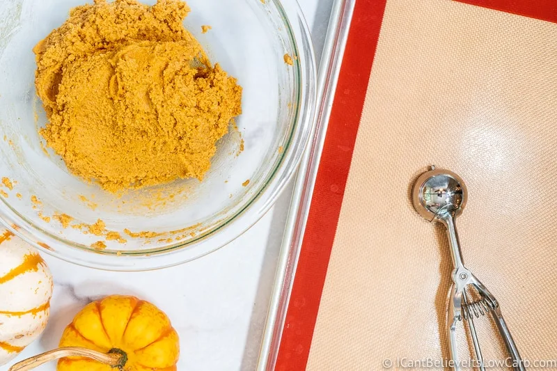 Keto Pumpkin Cookie dough and empty baking tray